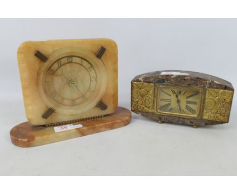 A French marble cased desk clock with metal mounts and one other, largest 17 cm (h). [2]