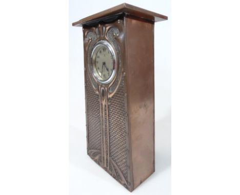 An early 20thC HAC Art Nouveau design copper mantel clock, the 6cm Arabic dial with chrome surround in heavily hammered case 