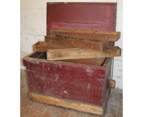 A 19thC tool chest, partially painted purple, with rectangular outline, with overhanging top, 67cm high, 100cm wide, 65cm dee