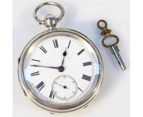 A Victorian silver open faced pocket watch, the 5cm dial with Roman numerals and subsidiary Arabic second hand revealing a ke
