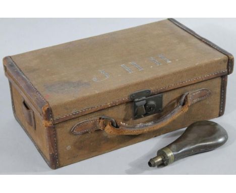 A late 19th/early 20thC leather and pressed hessian style cartridge box, of rectangular outline, the hinged lid revealing a f