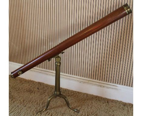 A Dolland of London mahogany cased telescope, with brass fittings and table standing tripod