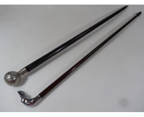 A 20thC walking stick, with plated greyhound head and rubber end, 93cm high, and an ebonised walking cane, with plated globe 