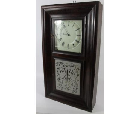 A 19thC American shelf clock, with flamed mahogany ogee case and marked for WL Gilbert & Co Connecticut, eight day movement, 