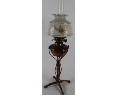 A WAS Benson style brass and copper table oil lamp