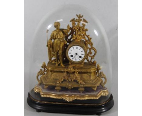 A 19thC French gilt metal mantel clock, the 8cm diameter enamel dial with Roman numerals, revealing an eight day key wind mov