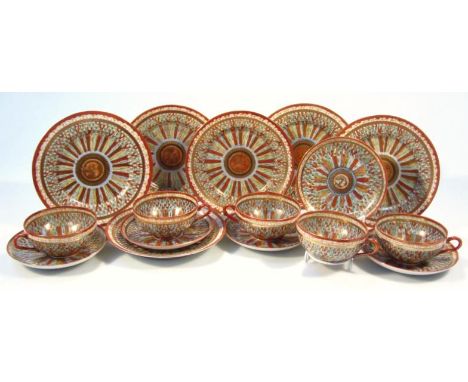 A Japanese Meiji period eggshell Kutani part tea service, comprising plates, side plates and cups, 5cm high, each decorated i