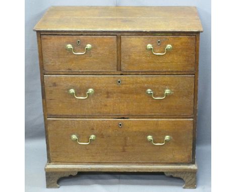NEATLY PROPORTIONED ANTIQUE OAK CHEST of two short over two long drawers, pine lined with replacement brass pommels and swan 