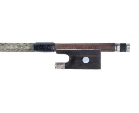 Violin bow stamped R &amp; M Millant á Paris, the stick round, the ebony frog inlaid with pearl eyes (one missing) and the eb