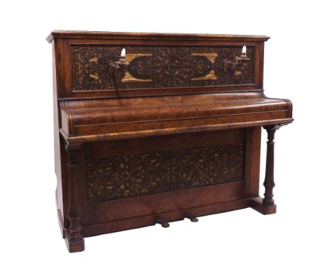 Upright piano by John Broadwood &amp; Sons, London, 1873, the case of burr walnut with intricately fretted panels above and b