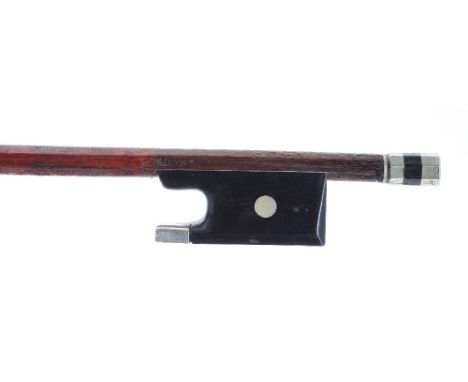 Nickel mounted violin bow after Vuillaume stamped J. Martin, the stick round, the ebony frog inlaid with pearl eyes and the e