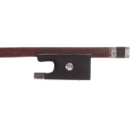 French silver mounted violin bow stamped Harmand, the stick round, the ebony frog inlaid with pearl eyes and the ebony adjust