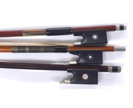 Nickel mounted violin by and stamped R. Paesold, 61gm; also two other nickel mounted violin bows (3)