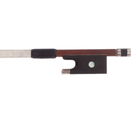 Silver mounted violin bow stamped Dodd, the stick round, the ebony frog inlaid with pearl eyes and the ebony adjuster with tw