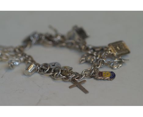 Silver charm bracelet with 15 charms