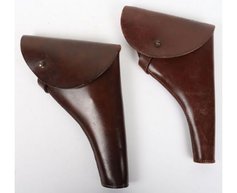 Army Sam Browne Holsters: Two brown leather holsters with brass metal work and belt loops to back in good condition. 2 items 