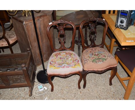 PAIR OF VICTORIAN BALLOON BACK MAHOGANY DINING CHAIRS DECORATED WITH CARVED DETAIL, UPHOLSTERED WITH TAPESTRY SEATS, RAISED O