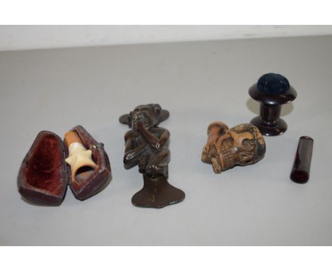 MIXED LOT: SMALL BRONZED METAL DOOR KNOCKER, A CHEROOT HOLDERS AND A TOBACCO PIPE BOWL FORMED AS A SKULL, AND A TURNED WOODEN