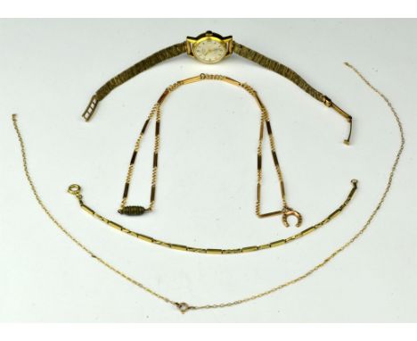 A selection of jewellery including a bar and chain link necklace, on a base metal clasp with a horseshoe pendant, length 42cm