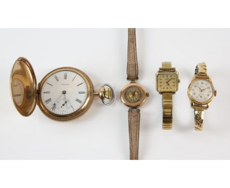 A collection of watches including a gold plated Waltham pocket watch with Roman numeral hour markers, a subsidiary seconds di