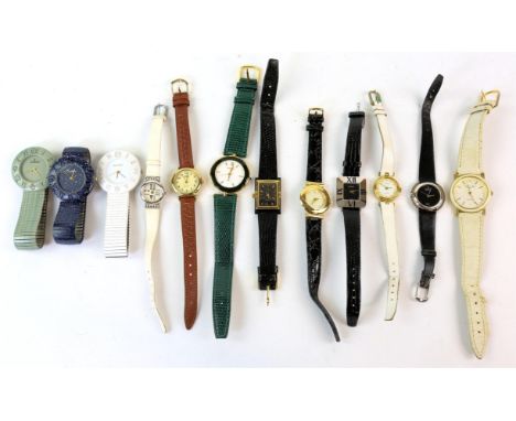 Group of costume watches, including Timex, Monet, Rado, and many others (13)