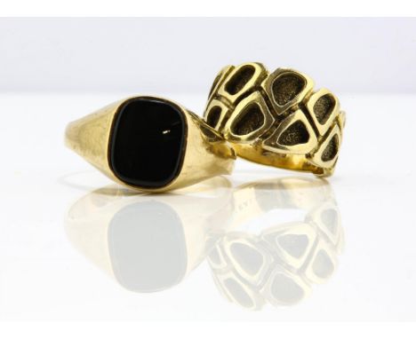 Two rings, one onyx set signet ring in 9 ct gold, ring size Z+2, together with a modern textured ring testing 14 ct, stamped 