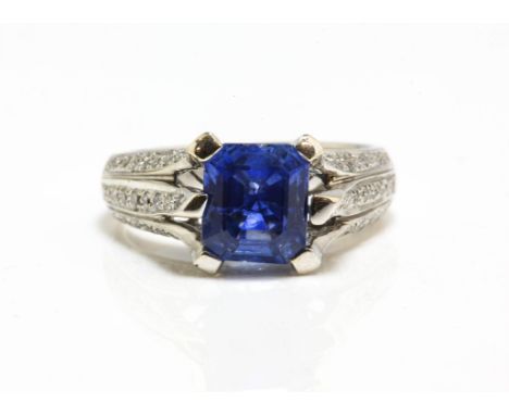 Sapphire and diamond ring, emerald-cut sapphire weighing an estimated 2.71 carats, with diamond set shoulders, gallery and cl