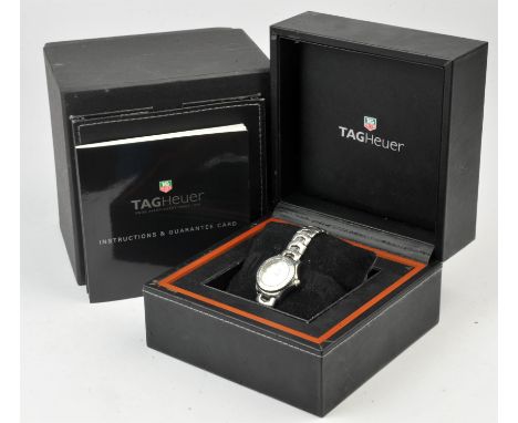 A Tag Heuer Link ladies wristwatch, 30mm face with crown, signed mother of pearl dial with diamond set hour markers, and date