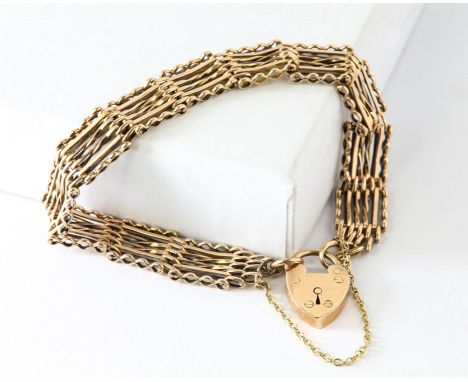 Vintage twist link gate bracelet, with heart padlock clasp and safety chain, stamped 9 ct,18cm in lengthCondition Report:  Gr