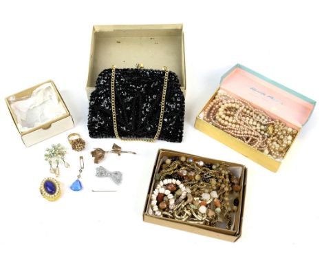 A collection of costume jewellery including faux pearl necklaces, tumbled gemstone necklaces, paste set brooches, a trinket b