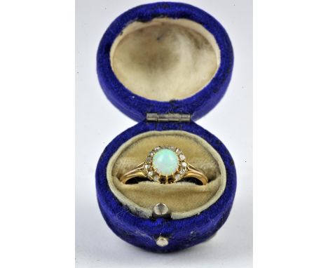 Victorian opal and diamond ring, central round 6mm cabochon cut opal, surrounded by rose cut diamonds, mounted in 9 ct yellow