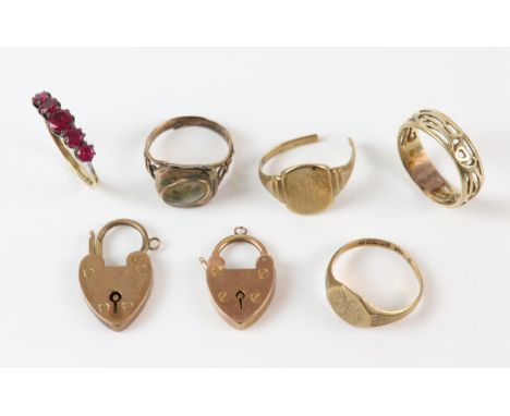 A Collection of 9ct jewellery including two heart padlocks, a five stone synthetic ruby ring, two signets, one with a cut sha