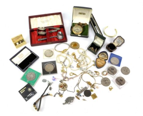 A collection of costume jewellery, including faux pearl necklaces, a base metal pocket watch chain, commemorative coins, broo