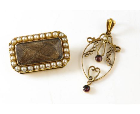 An oval openwork pendant set with seed pearls and garnets, mounted in 9 ct, 4cm x 1.5cm, together with a mourning brooch, rec
