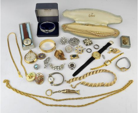 A collection of costume jewellery including two imitation pearl necklaces, one with a 9ct clasp, four brooches, including an 