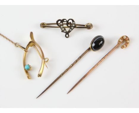 A collection of 9 ct pins and brooches, including a wishbone brooch set with turquoise, a horseshoe brooch set with seed pear