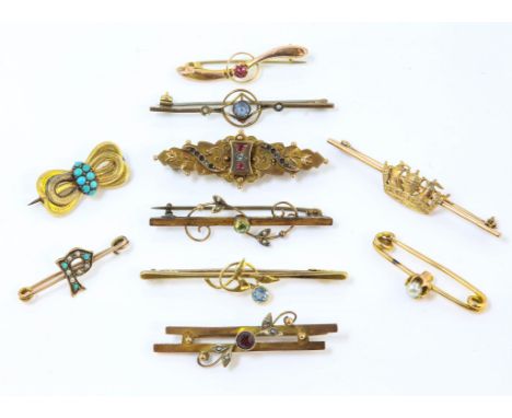 A selection of bar brooches, including a turquoise bow, a seed pearl and turquoise 'P'  a peridot and seed pearl, a crown, a 