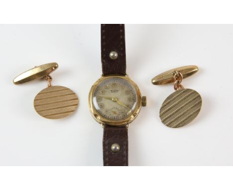 Gold cased Dot wrist watch, round dial with Arabic numerals, minute track and subsidiary dial, mechanical movement, in 9 ct c