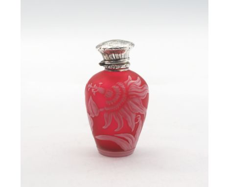 A late 19th century cameo glass small scent bottle, of baluster shape in ruby colourway with relief flowers and foliage decor