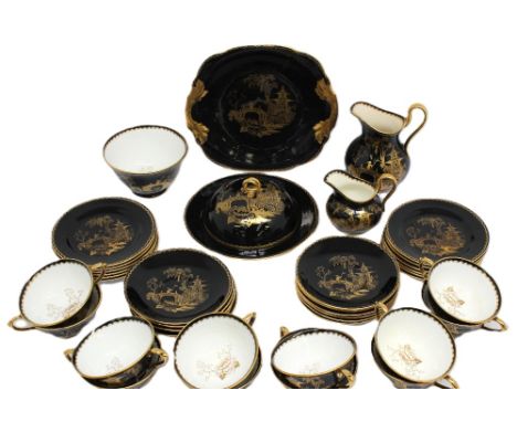 A Chelson China black ground gilt chinoiseries part tea set consisting of twelve cups and saucers; twelve side plates; milk j