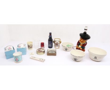 An English fine bone china HM Queen Elizabeth II Diamond Jubilee commemorative two handled tapering mug with Royal Arms to fr