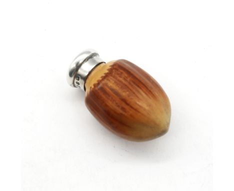 A late Victorian novelty silver topped hazelnut shaped porcelain scent bottle, registration no. 89920 issued to Macintyre & C