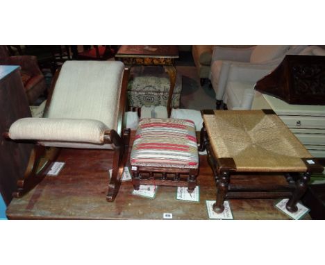 A Victorian 'X' framed footstool, a Victorian oak framed footstool on bobbin turned supports and another square oak footstool