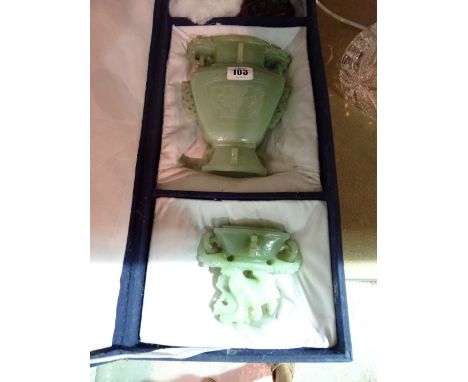 An Asian green hardstone urn and cover, cased, a cut glass table lamp and shade, (qty).