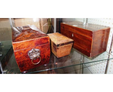A George IV mahogany tea caddy 30cm wide x 16cm high, a Regency yew wood caddy of sarcophagus form, 30cm wide x 18cm high and