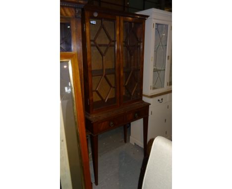 A George III style two door display cabinet on twin drawer base with tapering square supports, 84cm wide x 182cm high.