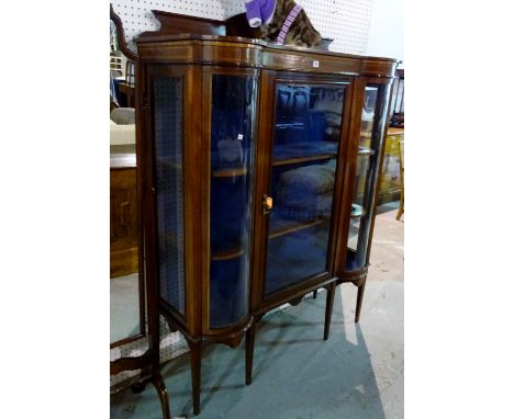 An Edwardian mahogany inlaid display cabinet on tapering square supports, 150cm wide x 123cm high. 