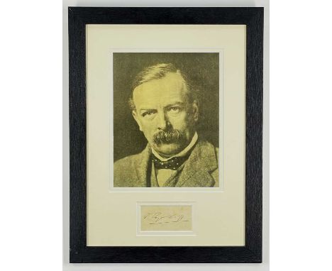 DAVID LLOYD GEORGE AUTOGRAPH on House of Commons embossed paper / card, 4.5 x 9cms, framed and glazed together with a reprodu