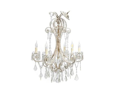 A Cut and Moulded Glass Six-Light Chandelier, in Regency style, with scroll branches hung with beaded swags and faceted drop,