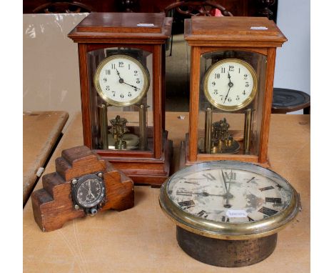 Two Four Glass Gustav Becker Anniversary Clocks, a ships type bulkhead wall timepiece and a WWII Junghans German cockpit cloc